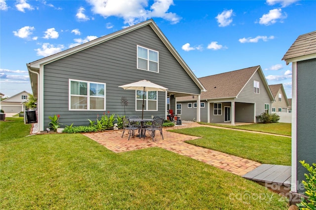117 Cup Chase Dr, Mooresville, NC 28115 - rear view of property with a yard and a patio