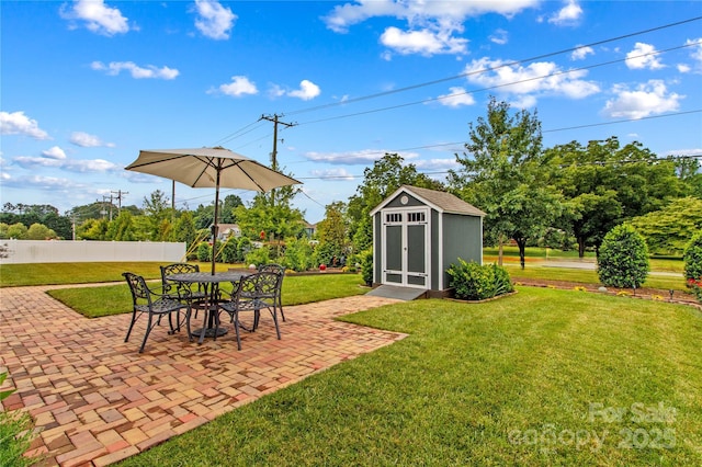 117 Cup Chase Dr, Mooresville, NC 28115 - view of grassy yard with a patio area, a shed, and outdoor dining area