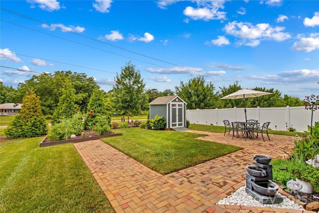 117 Cup Chase Dr, Mooresville, NC 28115 - fenced backyard with a storage unit and a patio area