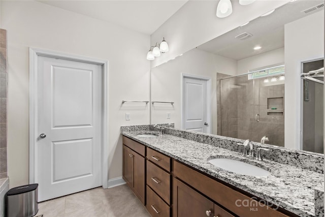 117 Cup Chase Dr, Mooresville, NC 28115 - bathroom with double vanity, a stall shower, and tile patterned floors