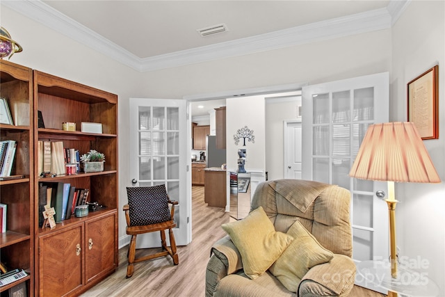 117 Cup Chase Dr, Mooresville, NC 28115 - sitting room with ornamental molding and light wood-style floors