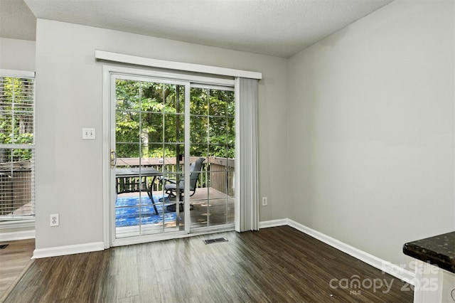 824 17th Avenue Dr SE, Hickory, NC 28602 - doorway featuring dark wood-style floors and a textured ceiling