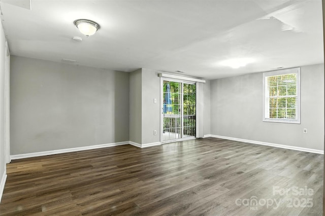 824 17th Avenue Dr SE, Hickory, NC 28602 - spare room featuring healthy amount of natural light and dark wood-style floors