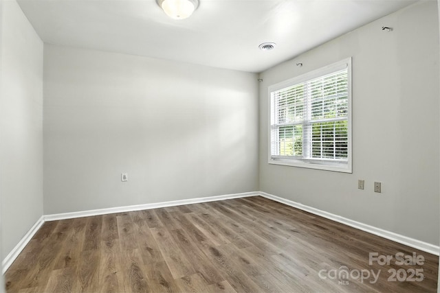 824 17th Avenue Dr SE, Hickory, NC 28602 - unfurnished room featuring wood finished floors