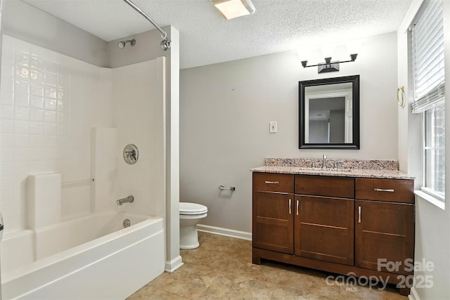 824 17th Avenue Dr SE, Hickory, NC 28602 - bathroom with vanity, tub / shower combination, and a textured ceiling