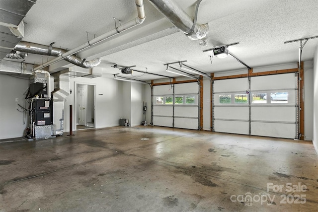 824 17th Avenue Dr SE, Hickory, NC 28602 - garage with heating unit and a garage door opener