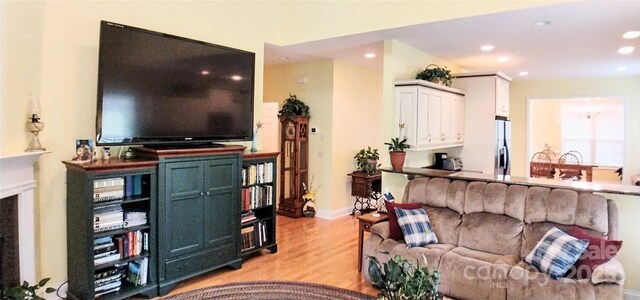 22 Florian Ln, Fletcher, NC 28732 - living area with light wood finished floors and recessed lighting
