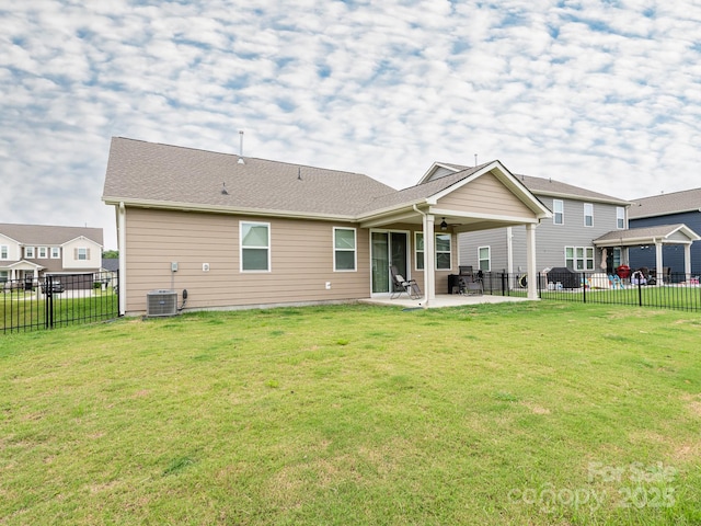 1711 Woodend Dr, Indian Trail, NC 28079 - back of house with ceiling fan, a patio, and a fenced backyard