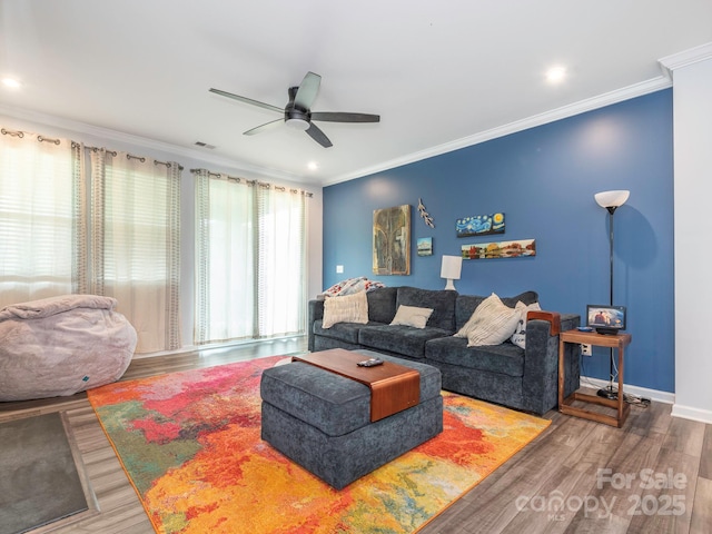 1711 Woodend Dr, Indian Trail, NC 28079 - living area with ceiling fan, ornamental molding, wood finished floors, and recessed lighting
