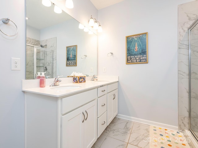 1711 Woodend Dr, Indian Trail, NC 28079 - bathroom featuring marble finish floors, double vanity, and a marble finish shower