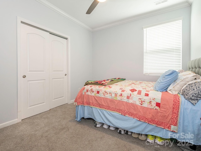 1711 Woodend Dr, Indian Trail, NC 28079 - bedroom featuring crown molding, carpet, a closet, and ceiling fan
