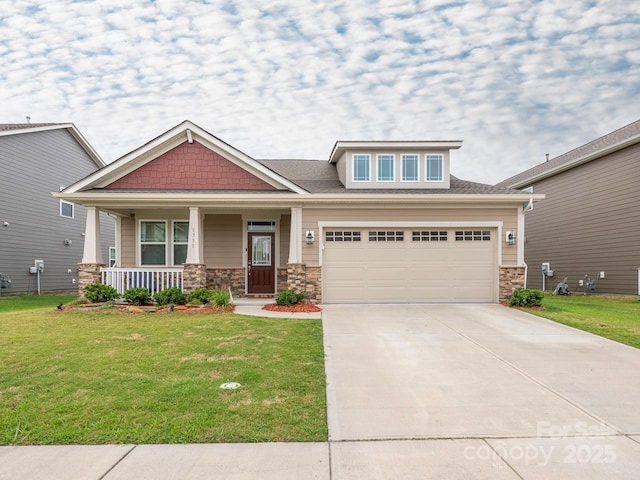 1711 Woodend Dr, Indian Trail, NC 28079 - craftsman inspired home with a front lawn, driveway, stone siding, a porch, and an attached garage