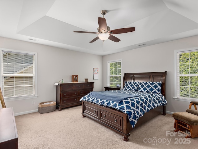 178 Black River Rd, Fletcher, NC 28732 - bedroom featuring light colored carpet, a ceiling fan, and a tray ceiling