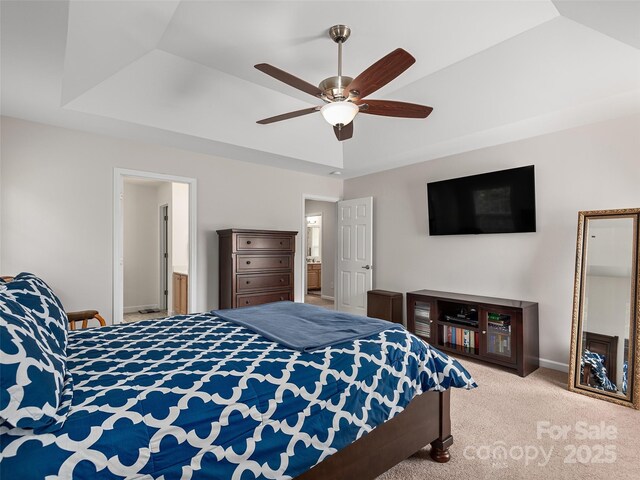 178 Black River Rd, Fletcher, NC 28732 - bedroom featuring carpet floors, a tray ceiling, a ceiling fan, and ensuite bath