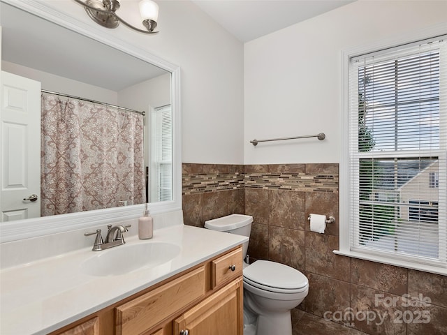178 Black River Rd, Fletcher, NC 28732 - full bathroom with tile walls, vanity, tile patterned floors, and a wainscoted wall
