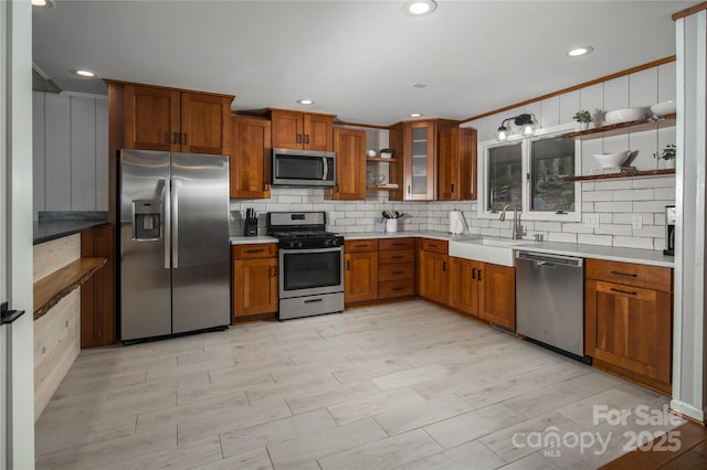 1648 Skyland Dr Unit 77, Seven Devils, NC 28604 - kitchen with appliances with stainless steel finishes, open shelves, brown cabinetry, tasteful backsplash, and recessed lighting