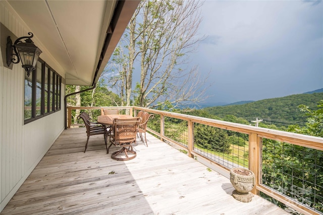 1648 Skyland Dr Unit 77, Seven Devils, NC 28604 - deck featuring outdoor dining area and a forest view