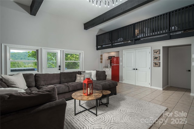 1648 Skyland Dr Unit 77, Seven Devils, NC 28604 - living area with a towering ceiling, light tile patterned floors, and beam ceiling