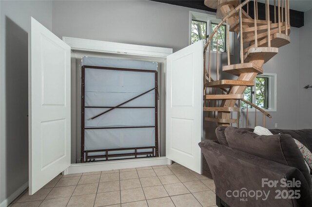 1648 Skyland Dr Unit 77, Seven Devils, NC 28604 - tiled entrance foyer featuring stairs and healthy amount of natural light