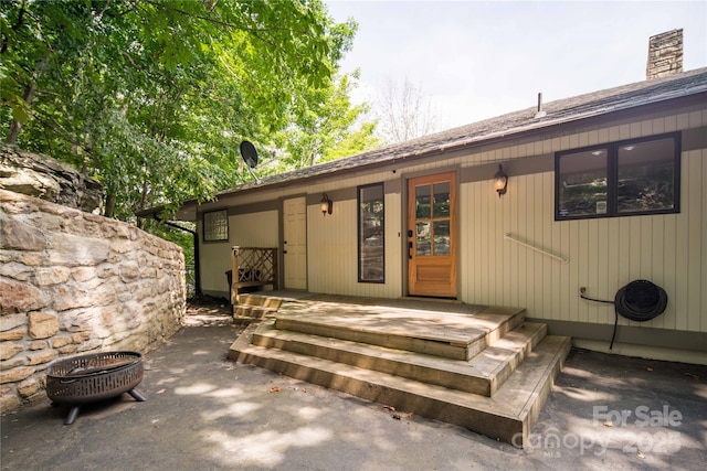 1648 Skyland Dr Unit 77, Seven Devils, NC 28604 - property entrance featuring a chimney