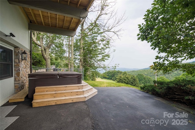 1648 Skyland Dr Unit 77, Seven Devils, NC 28604 - view of patio featuring a hot tub