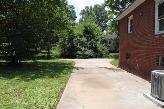 1125 Fries St, Salisbury, NC 28144 - view of green lawn featuring a patio area