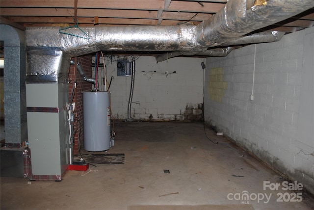 1125 Fries St, Salisbury, NC 28144 - unfinished basement featuring water heater and heating unit