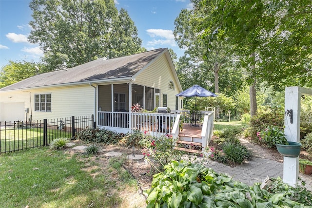 101 Citation Ln, Gastonia, NC 28056 - back of house featuring a sunroom, a wooden deck, a garage, and a shingled roof