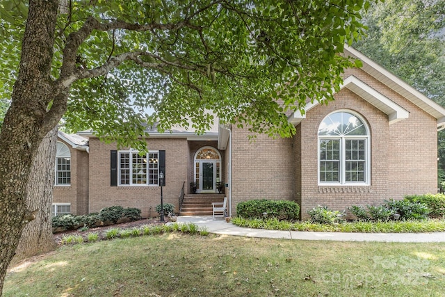 101 Citation Ln, Gastonia, NC 28056 - single story home with brick siding, a front lawn, and entry steps