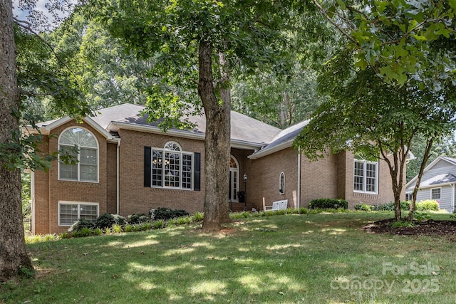 101 Citation Ln, Gastonia, NC 28056 - view of front facade with brick siding and a front yard