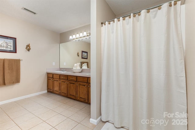 101 Citation Ln, Gastonia, NC 28056 - bathroom featuring double vanity, tile patterned flooring, and a shower with curtain