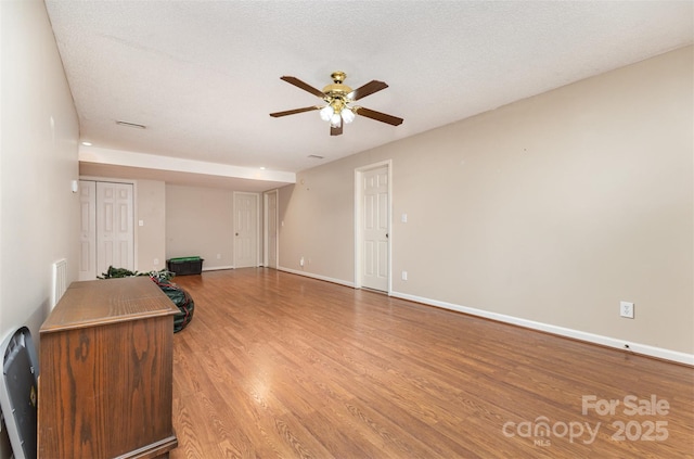 101 Citation Ln, Gastonia, NC 28056 - unfurnished living room featuring a ceiling fan and light wood-type flooring