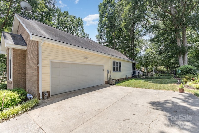 101 Citation Ln, Gastonia, NC 28056 - view of property exterior with concrete driveway, a garage, brick siding, and a shingled roof