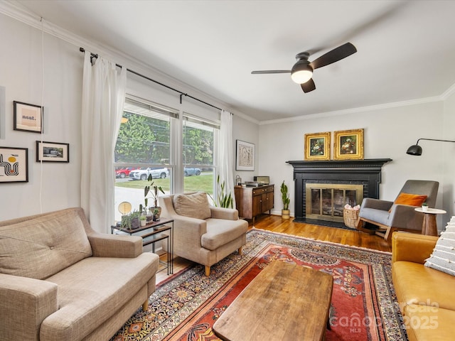 3200 Spring Valley Rd, Charlotte, NC 28210 - living room with wood finished floors, ceiling fan, crown molding, and a fireplace with flush hearth