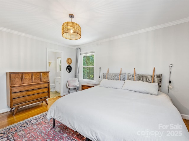 3200 Spring Valley Rd, Charlotte, NC 28210 - bedroom featuring wood finished floors, ornamental molding, and ensuite bath