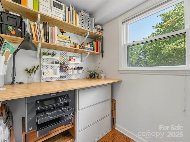 3200 Spring Valley Rd, Charlotte, NC 28210 - bar with baseboards and wood finished floors