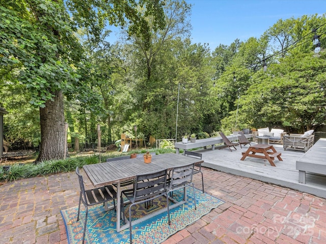 3200 Spring Valley Rd, Charlotte, NC 28210 - view of patio / terrace with outdoor dining space, a playground, a wooden deck, and an outdoor living space