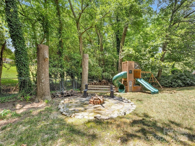 3200 Spring Valley Rd, Charlotte, NC 28210 - view of yard featuring a playground and a fire pit