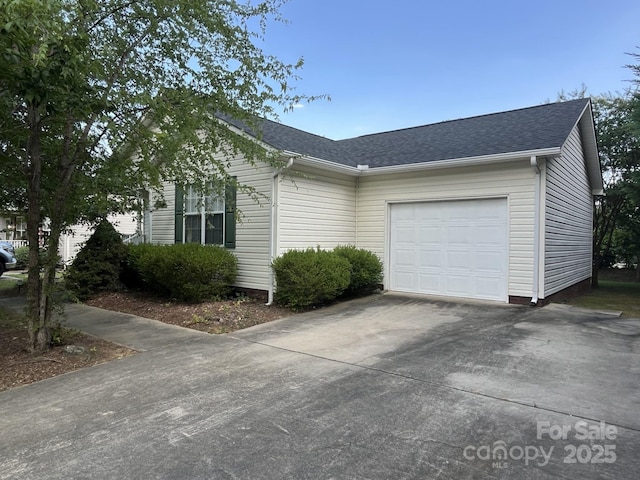 1015 Piney Church Rd, Concord, NC 28025 - view of home's exterior with a shingled roof, driveway, and a garage