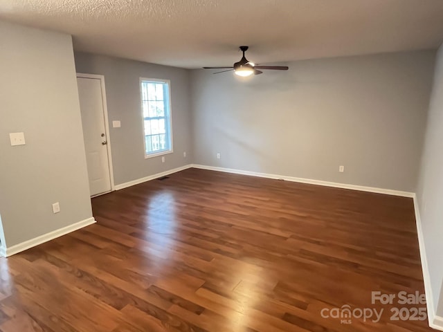 1015 Piney Church Rd, Concord, NC 28025 - unfurnished room featuring dark wood finished floors and ceiling fan