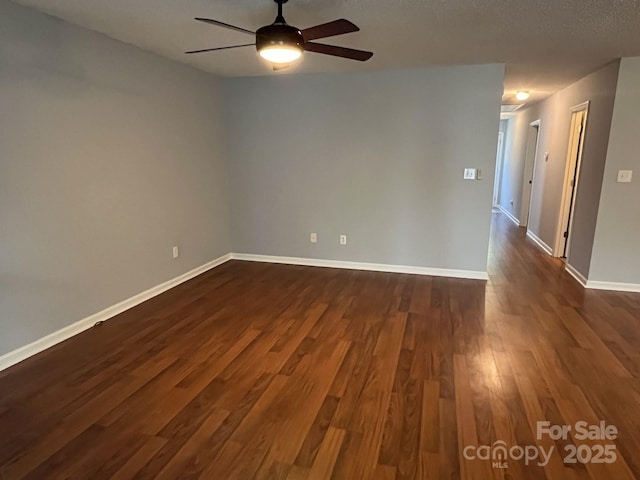 1015 Piney Church Rd, Concord, NC 28025 - unfurnished room featuring a ceiling fan and dark wood-type flooring