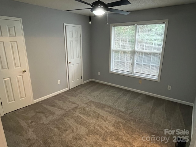 1015 Piney Church Rd, Concord, NC 28025 - unfurnished bedroom with carpet floors and ceiling fan
