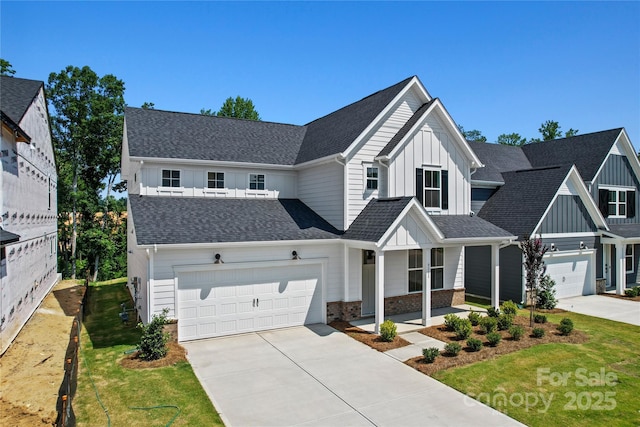 9511 Coast Laurel Ave NW, Concord, NC 28027 - modern inspired farmhouse featuring board and batten siding, concrete driveway, a front yard, and covered porch