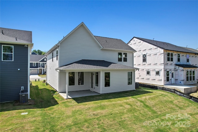 9511 Coast Laurel Ave NW, Concord, NC 28027 - rear view of property with a patio area and a lawn