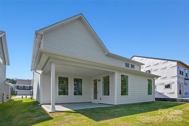 9511 Coast Laurel Ave NW, Concord, NC 28027 - back of property with a patio and a yard