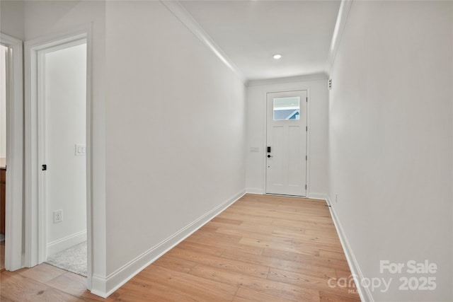 9511 Coast Laurel Ave NW, Concord, NC 28027 - corridor featuring light wood finished floors and crown molding
