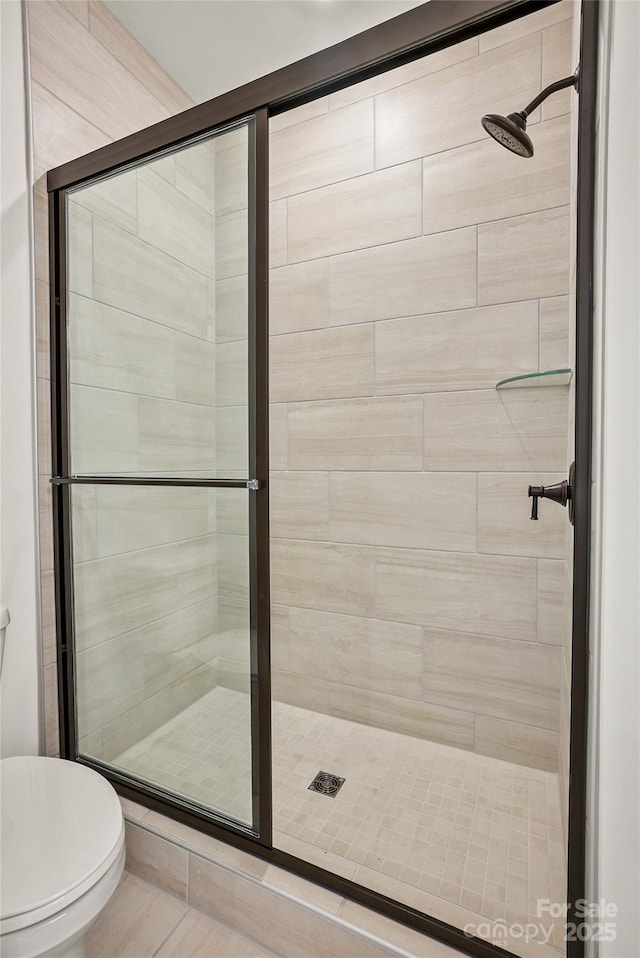 9511 Coast Laurel Ave NW, Concord, NC 28027 - bathroom featuring a shower stall