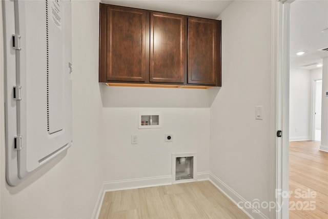9511 Coast Laurel Ave NW, Concord, NC 28027 - laundry area featuring hookup for a washing machine, cabinet space, and electric dryer hookup