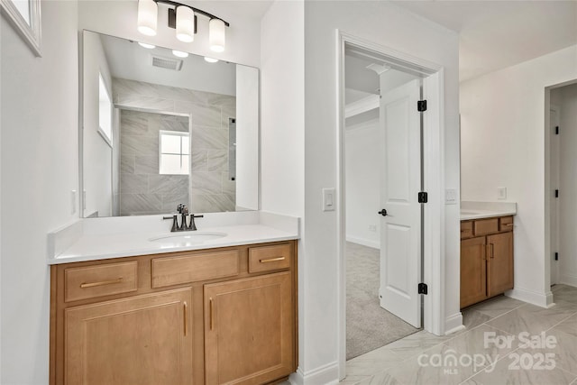 9511 Coast Laurel Ave NW, Concord, NC 28027 - full bath with vanity, tiled shower, and marble finish floors