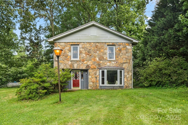 1058 Howard Gap Loop Rd, Flat Rock, NC 28731 - view of front of property with stone siding and a front lawn